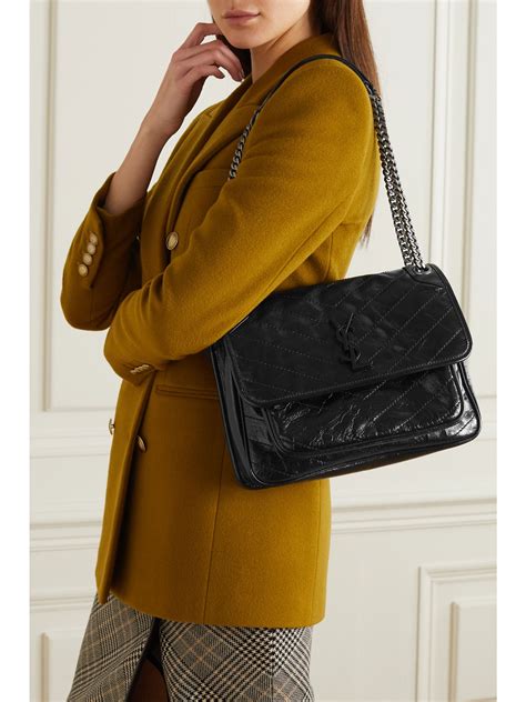 Saint Laurent Medium Niki Leather Shoulder Bag .